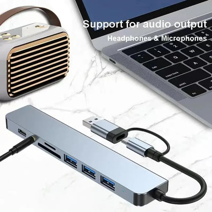 Gray 8-in-2 USB hub with USB-C port, SD and TF card reader, and multiple USB 3.0 and 2.0 ports for data transfer.