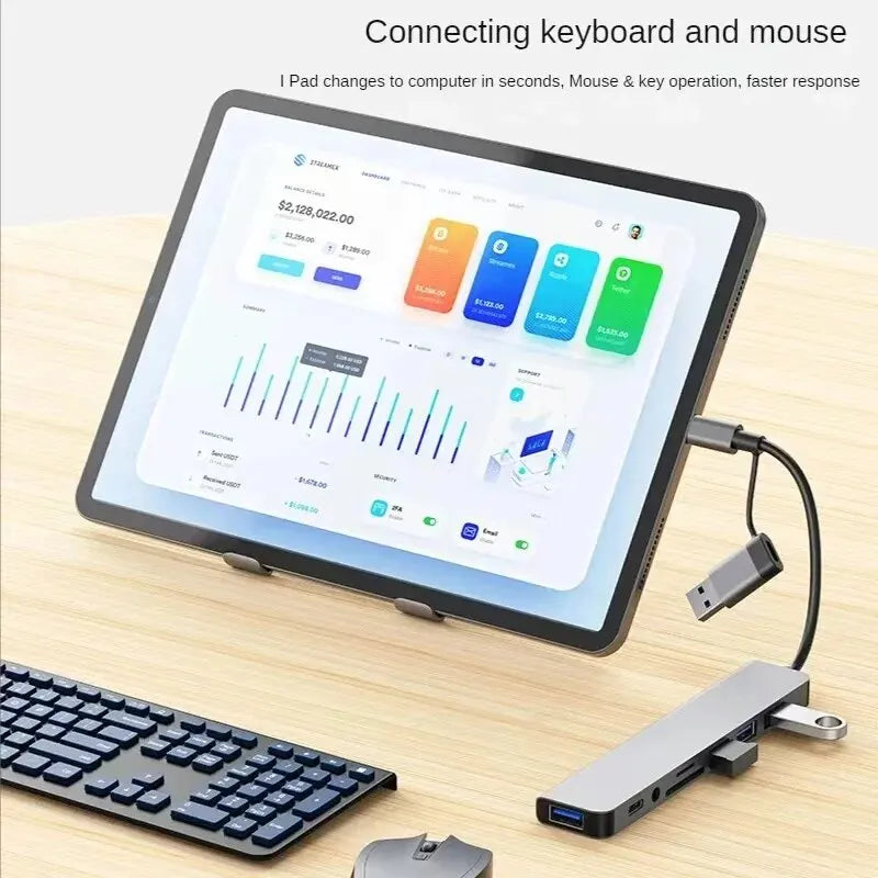 Gray 8-in-2 USB hub with USB-C port, SD and TF card reader, USB 3.0/2.0 splitter, and docking station for easy device connectivity