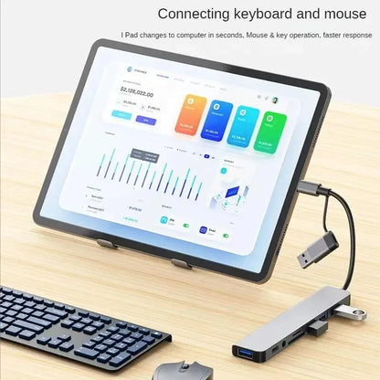 Gray 8-in-2 USB hub with USB-C port, SD and TF card reader, USB 3.0/2.0 splitter, and docking station for easy device connectivity