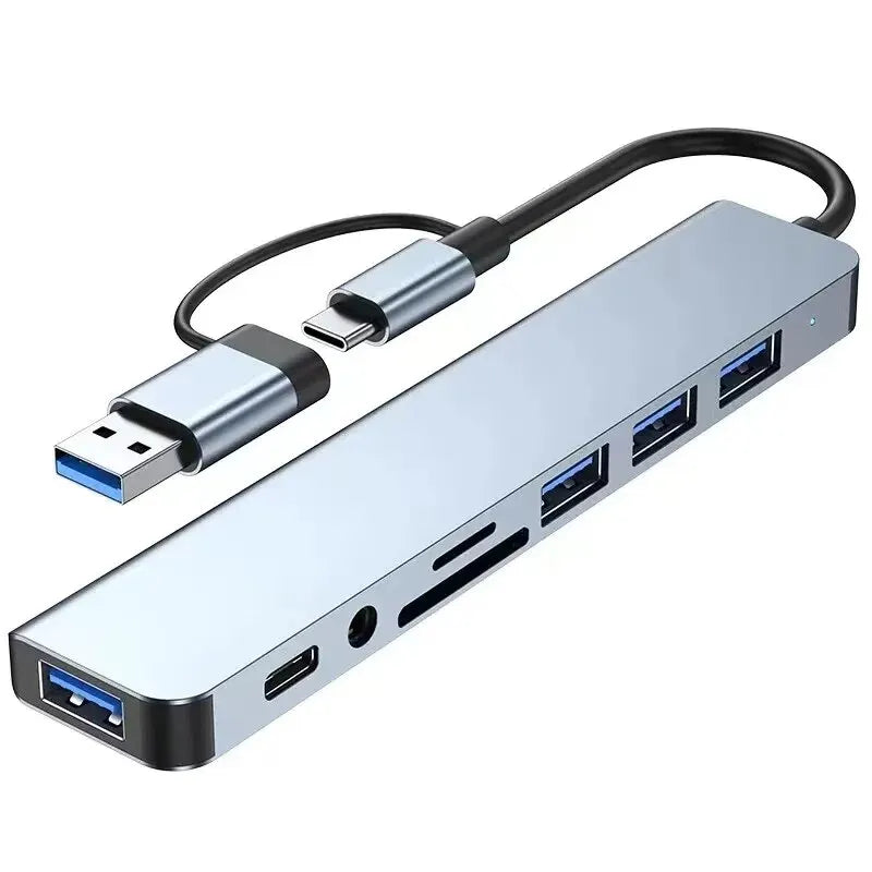 Gray 8-in-2 USB hub with USB-C port, SD/TF card reader, and multiple USB 3.0/2.0 ports, ideal for connecting devices and expanding ports.