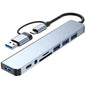 Gray 8-in-2 USB hub with USB-C port, SD/TF card reader, and multiple USB 3.0/2.0 ports, ideal for connecting devices and expanding ports.