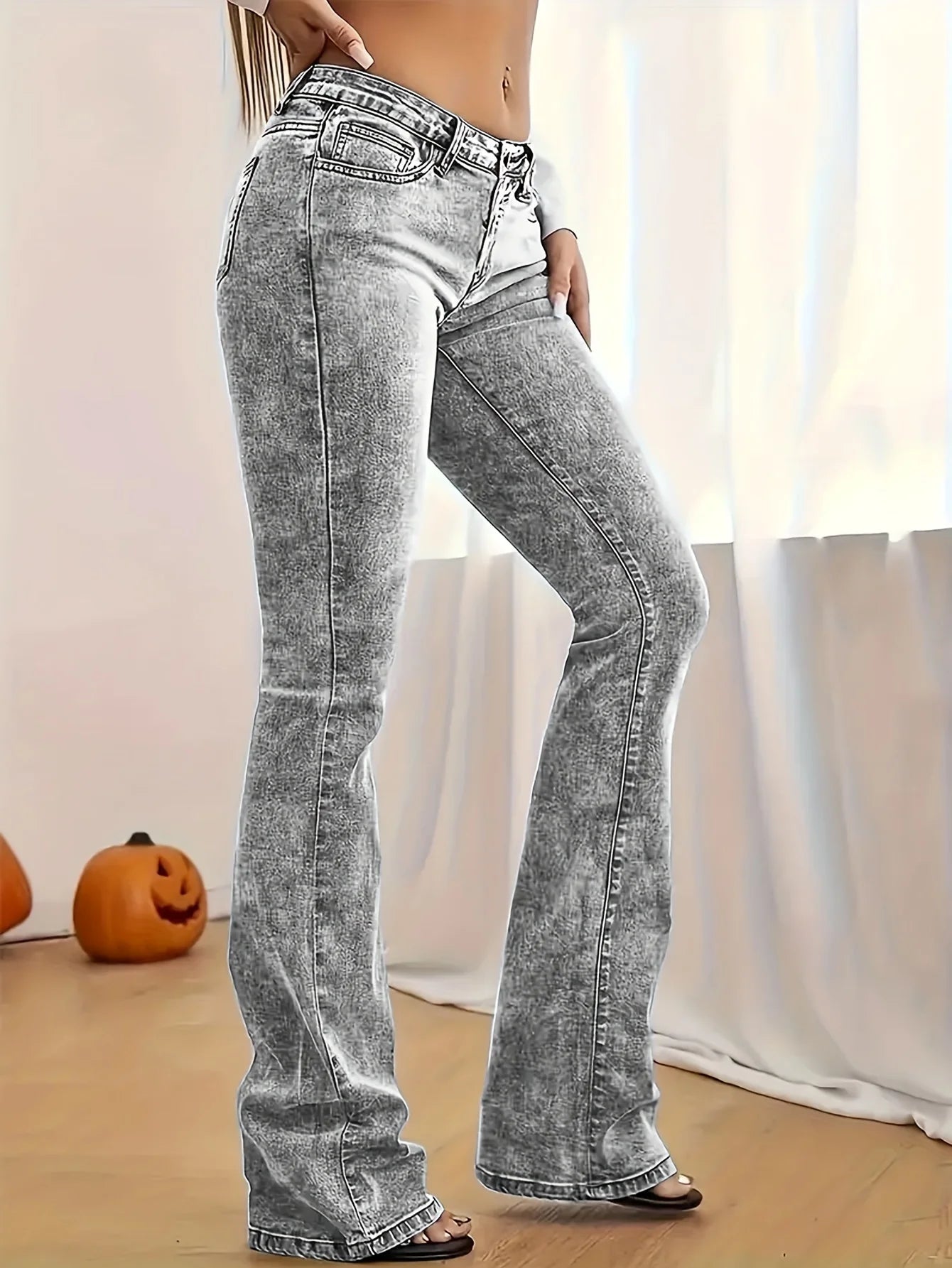 Women's gray low-rise slim-fit bootcut jeans with Y2K style, snow wash, streetwear-inspired elegant denim pants.