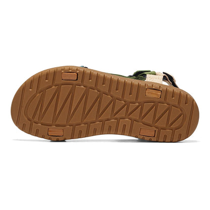 Green men's summer sandals by BACKUPMYFILESNOW.COM® featuring casual, lightweight outdoor footwear perfect for beach holidays.