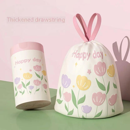 Green portable flower-scented trash bags with drawstring, made of high-density polyethylene, large size for home and office use.