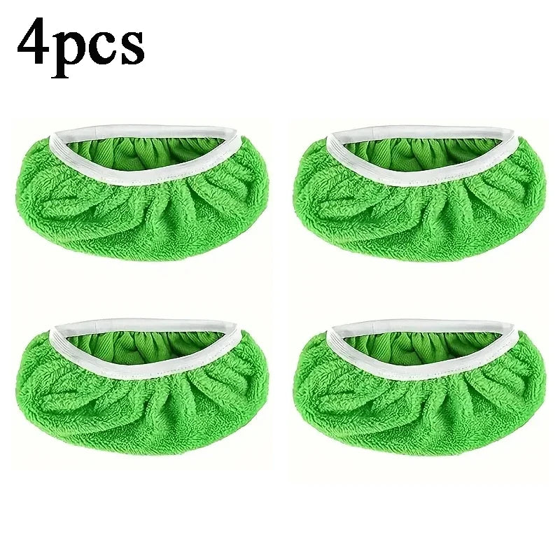 Set of four green reusable microfiber mop pads for Swiffer Sweeper mops, ideal for cleaning hardwood and surface floors.