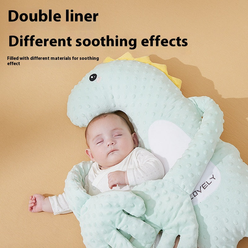 Green dinosaur baby pillow from BackupMyFilesNow.com, soft and supportive cushion for infants' comfort and safety.