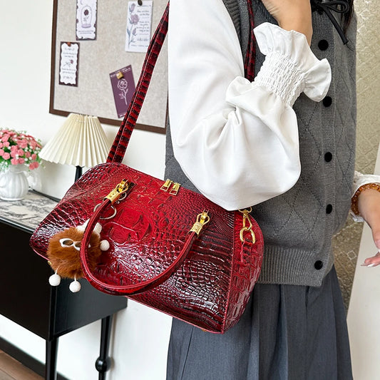 Black crocodile leather women's shoulder handbag with a classic design, featuring a crossbody strap for luxury fashion and everyday use