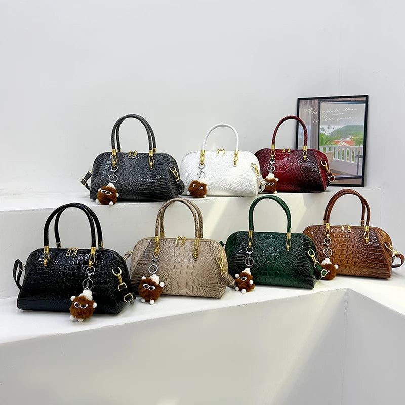 Black crocodile leather classic women's handbag with shoulder strap, designed for luxury and fashion, ideal for everyday or special occasions.