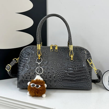 Black crocodile leather women's handbag with shoulder strap, classic crossbody design, luxurious designer fashion bag.