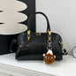 Black crocodile leather women's handbag with shoulder strap, designer crossbody bag for women, luxury fashion accessory.