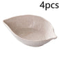 Japanese style small straw leaves snacks plate with intricate leaf design, perfect for serving appetizers or small bites.