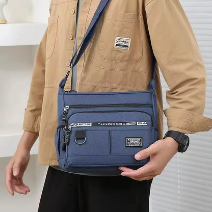 Green men's single shoulder bag from BackupMyFilesNow.com with multiple compartments, suitable for business and leisure use.