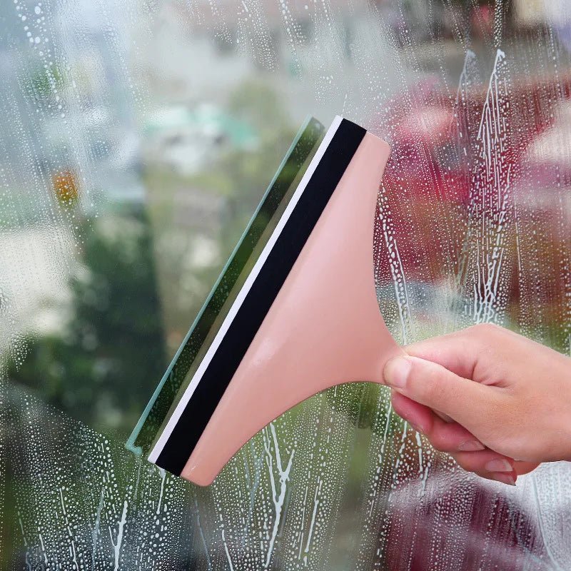Green soft silicone glass scraper and squeegee for car mirrors, windows, shower, and bathroom cleaning, with brush holder.