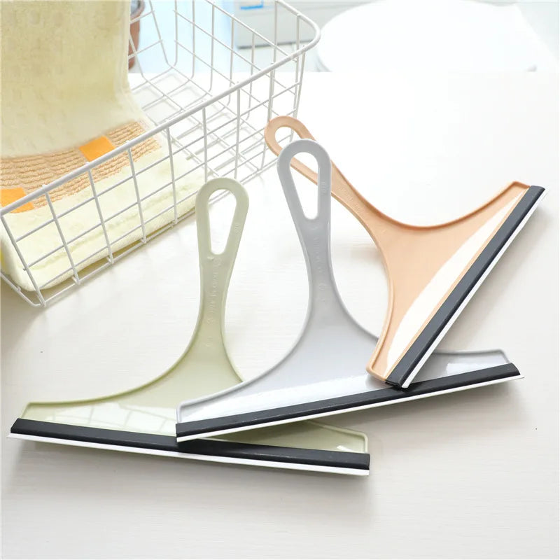Green soft silicone glass scraper and squeegee for car mirrors, shower, windows, and bathroom cleaning from BACKUPMYFILESNOW.COM®.