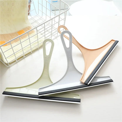Green soft silicone glass scraper and squeegee for car mirrors, shower, windows, and bathroom cleaning from BACKUPMYFILESNOW.COM®.