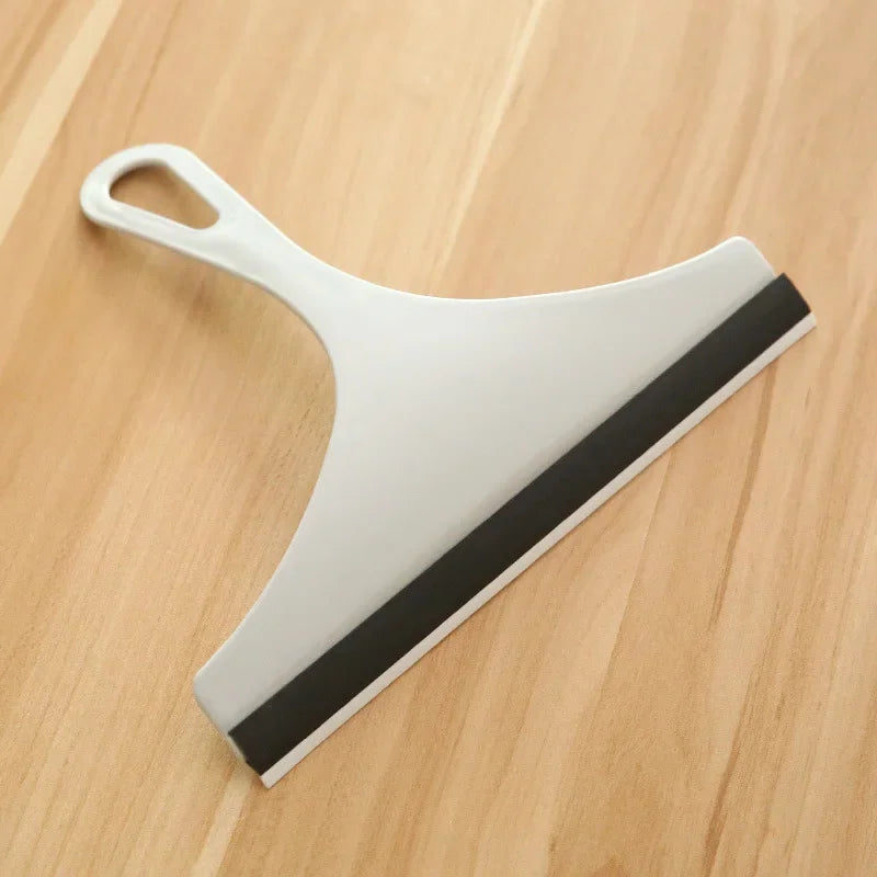 Green silicone glass scraper and squeegee for cars, mirrors, showers, and windows with a brush and holder from BACKUPMYFILESNOW.COM®