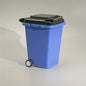 Grey portable mini office desk trash bin and pen holder for office supplies storage, compact and lightweight.
