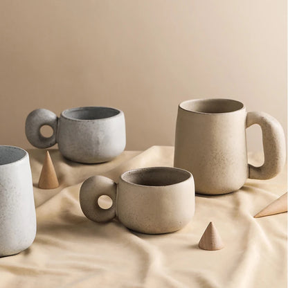 Grey Japanese stoneware retro coffee mug with handle, ideal for breakfast, milk, oatmeal, or water, perfect for office or gifts.