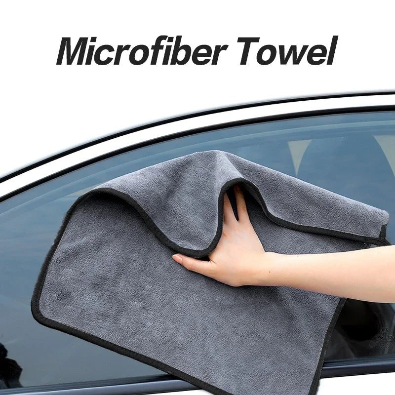 Grey microfiber car cleaning towel for automobile and motorcycle washing, ideal for glass and household cleaning.