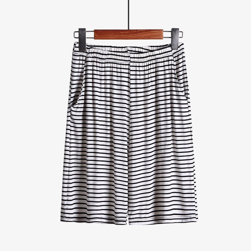 Plus size striped loose-fitting loungewear shorts in soft fabric, featuring a comfortable elastic waistband.