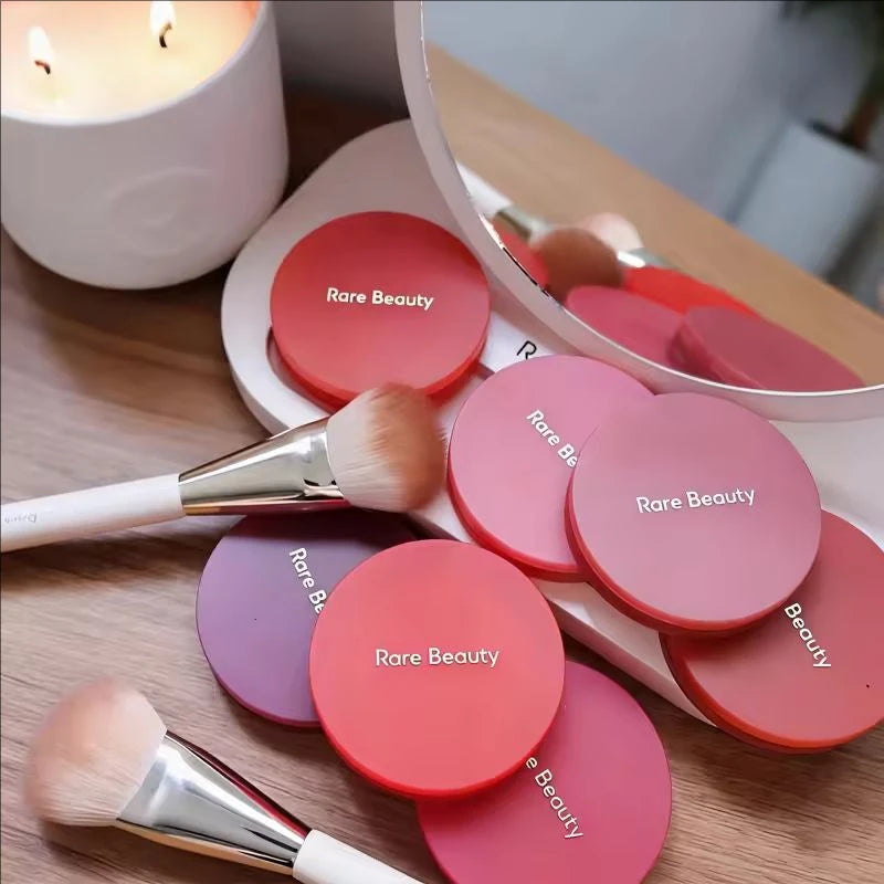 Rare Beauty cream-to-powder matte blush with bouncy, cushiony texture, long-lasting, waterproof, sweatproof, and natural brightening flush.