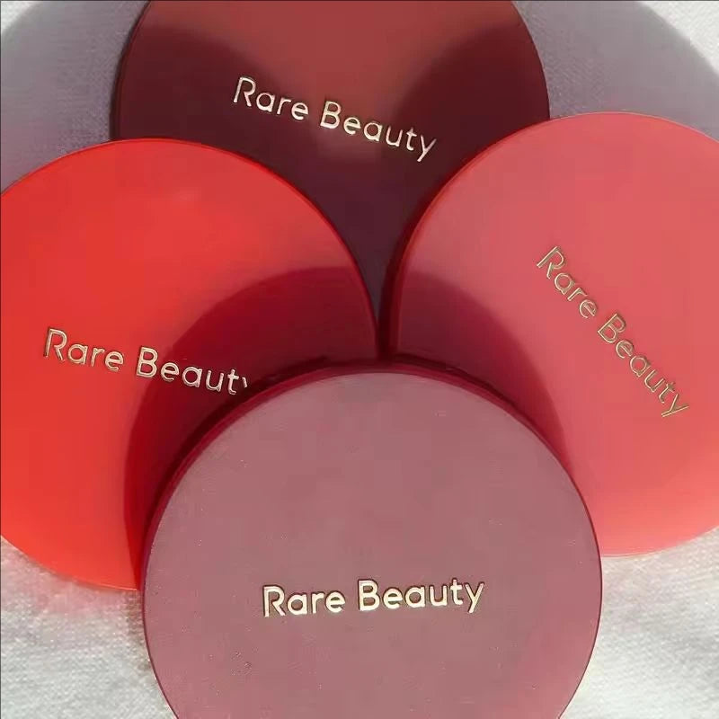Rare Beauty cream-to-powder matte blush with bouncy, cushiony texture, long-lasting, waterproof, sweatproof, and natural brightening flush.