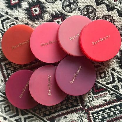 Rare Beauty powder blusher makeup set with matte finish, featuring liquid and powder blushes for easy application and lasting hydration.