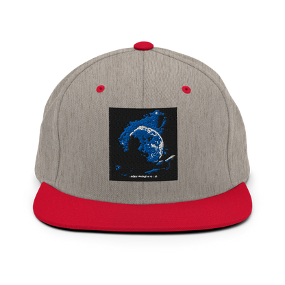 Heather grey and navy classic snapback cap by Yupoong 6089M, featuring a structured six-panel design with adjustable strap.