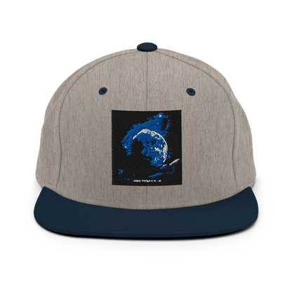 Heather grey and navy classic snapback hat by Yupoong 6089M with structured crown and adjustable strap, stylish and comfortable.