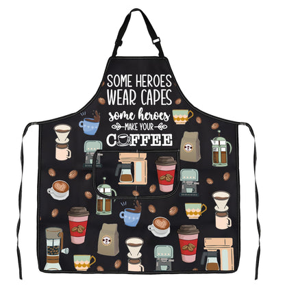 Black barista apron with coffee-themed print featuring the phrase "Some heroes wear capes, some make coffee" for baristas.