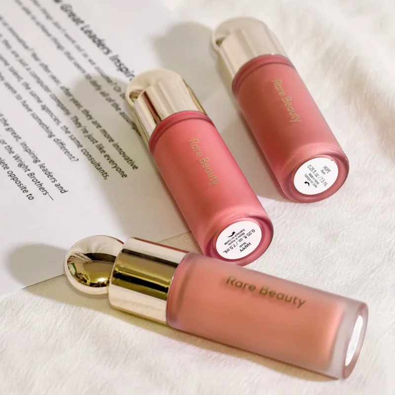 Rare Beauty liquid blush cream with dewy finish, portable multi-use cheek and lip tint, gentle makeup for a natural glow.
