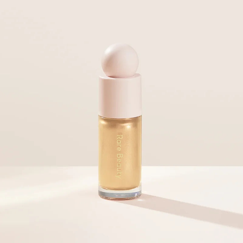 Rare Beauty liquid blush cream with dewy finish, blendable multi-use cheek and lip tint, portable and gentle makeup gift for girls.