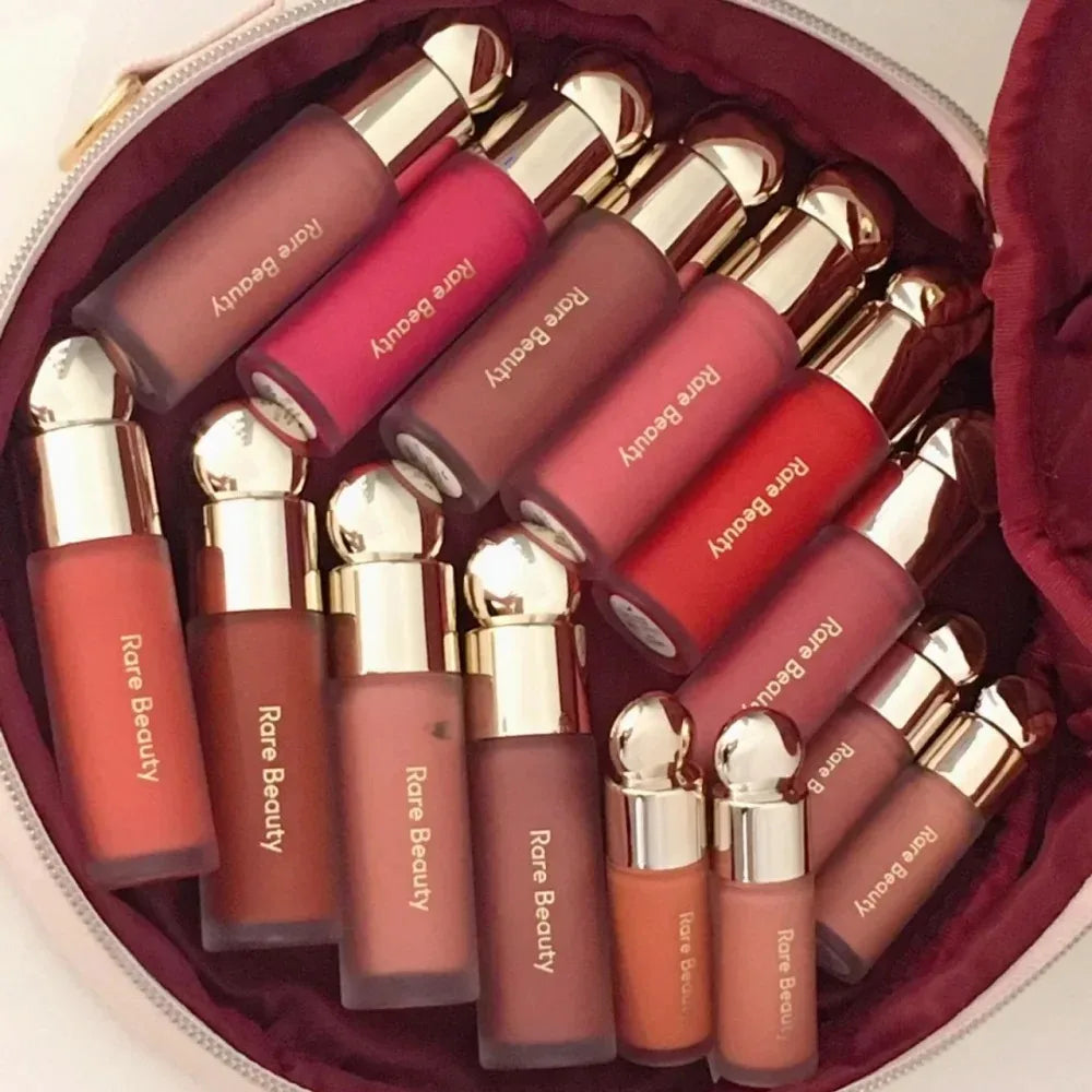 Rare Beauty matte long-lasting blush in soft-focus, cream-to-powder liquid formula, sweatproof, waterproof, and hydrating for a natural glow.