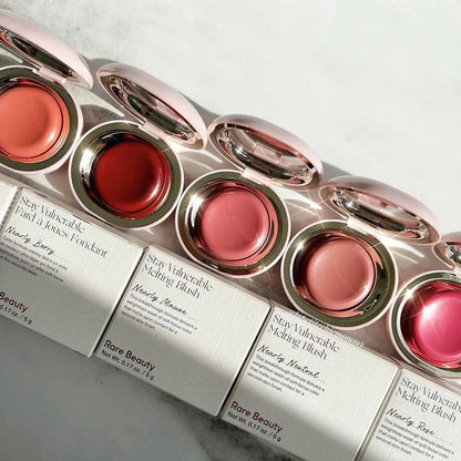 Rare Beauty matte long-lasting soft-focus blush in a smooth cream-to-powder formula, with a hydrating, sweatproof, waterproof liquid blush.