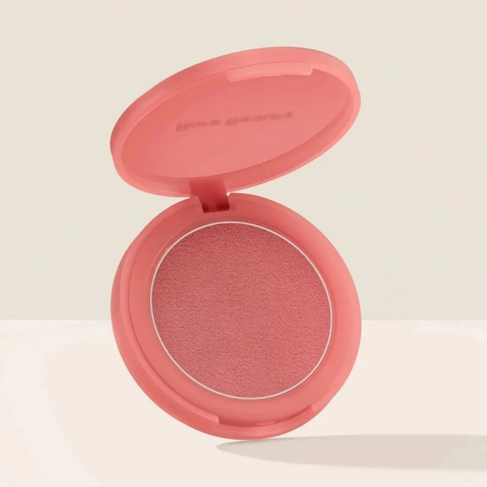 Rare Beauty soft-focus matte blush in cream-to-powder formula, showcasing a smooth, hydrating, sweatproof, waterproof liquid blush application.