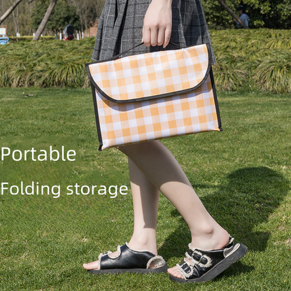 Thick waterproof picnic mat by BACKUPMYFILESNOW.COM® with a soft, cushioned surface, ideal for outdoor picnics and gatherings.