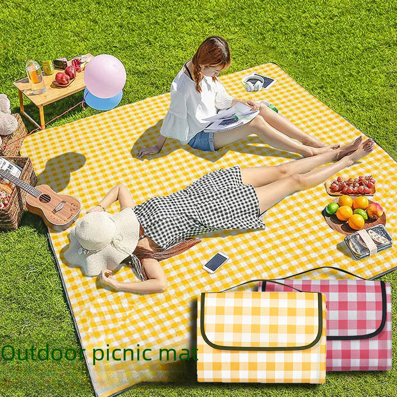 Thick waterproof picnic mat from BACKUPMYFILESNOW.COM® with a soft, durable surface, suitable for outdoor gatherings and camping.