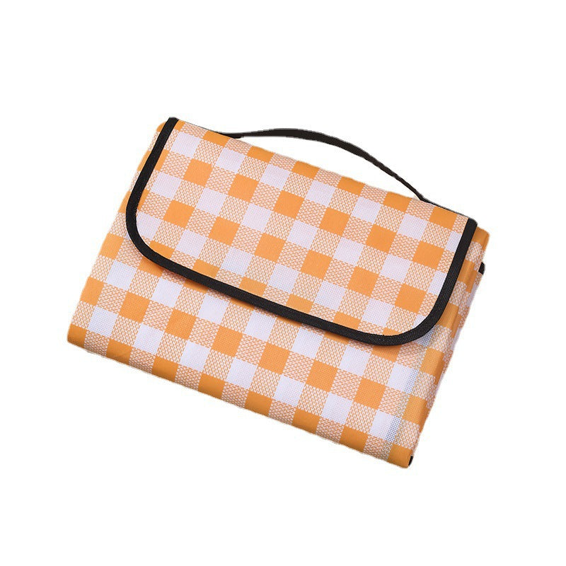 Thick waterproof picnic mat by BACKUPMYFILESNOW.COM® with a soft, cushioned surface for outdoor gatherings and picnics.