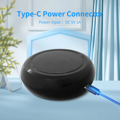 Tuya Smart WiFi IR Remote Controller for smart home devices, compatible with Alexa and control panel app, black device with buttons.