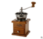 Manual coffee grinder from BACKUPMYFILESNOW.COM® with a compact design, featuring a ceramic burr mill and a sleek black finish.