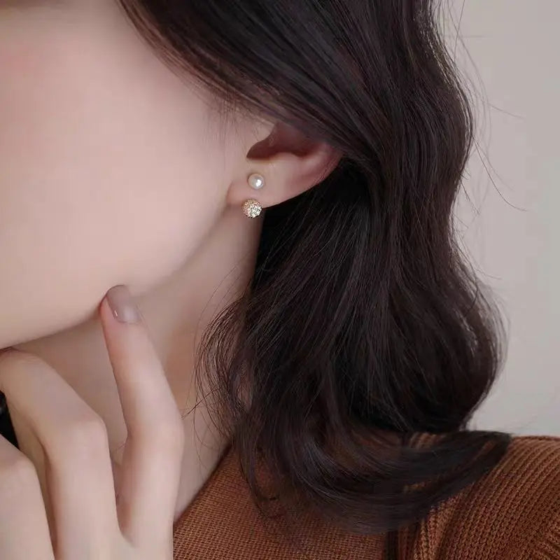 S925 pure silver earrings featuring a unique and niche design, perfect for ear holes, showcased in a close-up image.