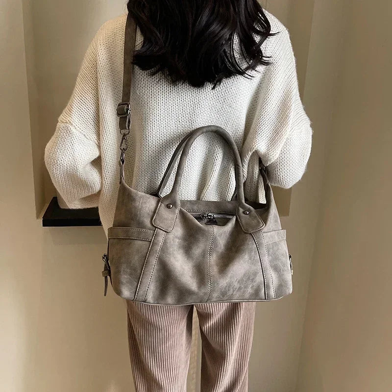 Retro design PU leather shoulder bag for women, 2024 Korean fashion high-capacity crossbody tote handbag in coffee color.