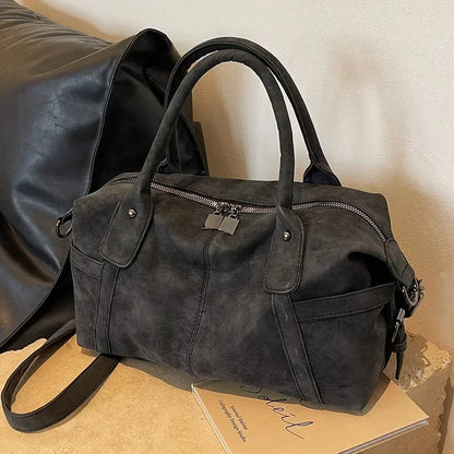 Coffee-colored retro design PU leather shoulder bag for women, high-capacity crossbody tote with stylish Korean fashion elements.