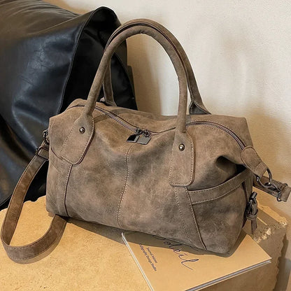 Coffee-colored retro design PU leather shoulder bag for women, featuring high capacity, crossbody style, and Korean fashion influence.