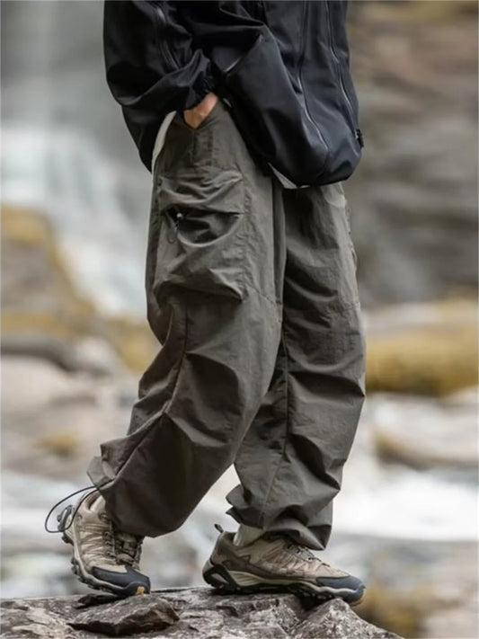 Men's waterproof spring and autumn mountaineering cargo pants by BACKUPMYFILESNOW.COM®, black Harajuku casual work pants outwear.