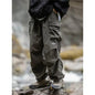 Men's waterproof hip-hop mountaineering pants in black, casual Harajuku work style, suitable for spring and autumn outdoor activities.