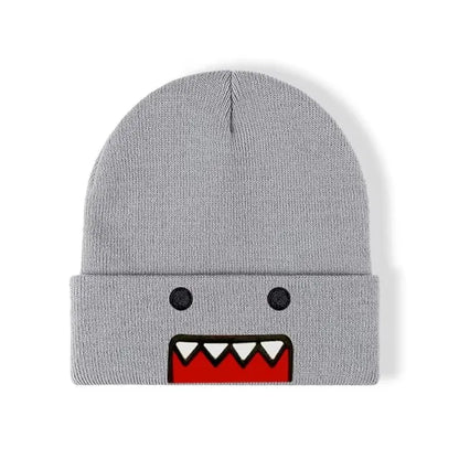 Khaki Domo Kun cartoon embroidered knitted hat, warm, windproof winter accessory for men and women, casual hip-hop style.