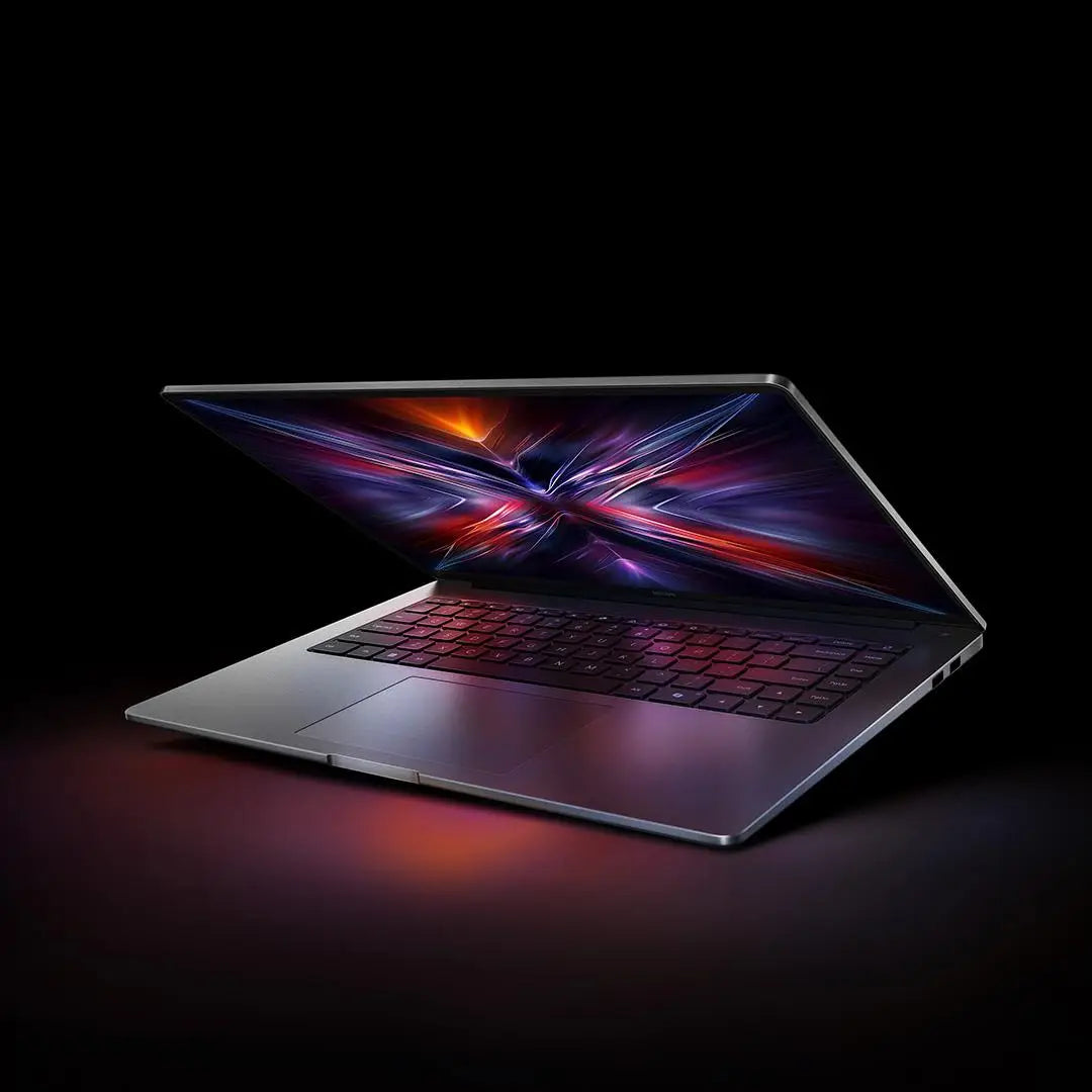 Xiaomi Redmi Book 14 2025 laptop with 2.8K 120Hz display, Intel Core 5 220H, 16GB RAM, and large SSD storage.