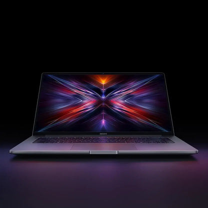 Xiaomi Redmi Book 14 2025 laptop with 2.8K 120Hz display, Intel Core i5 220H, 16GB RAM, 512GB SSD, and sleek design.