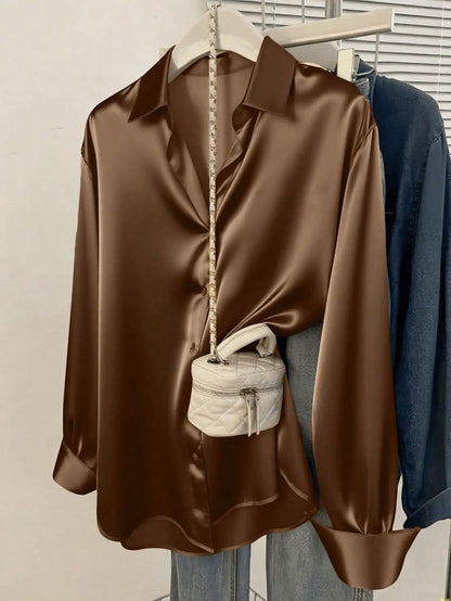 Women's pink satin button-up blouse with a collared neckline, perfect for office or casual wear in autumn, winter, and spring.